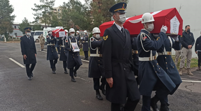 Baba-oğul törenle uğurlandı