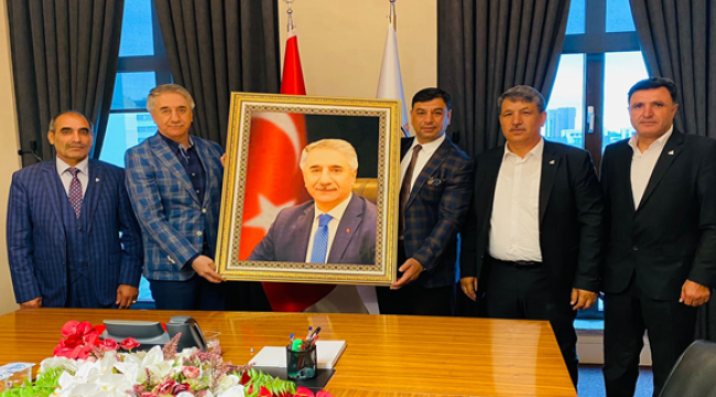 Başkan Aslan , Mücahit Yanılmaz'ı makamında ziyaret etti.