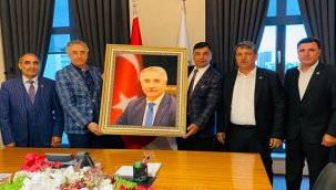 Başkan Aslan , Mücahit Yanılmaz'ı makamında ziyaret etti.