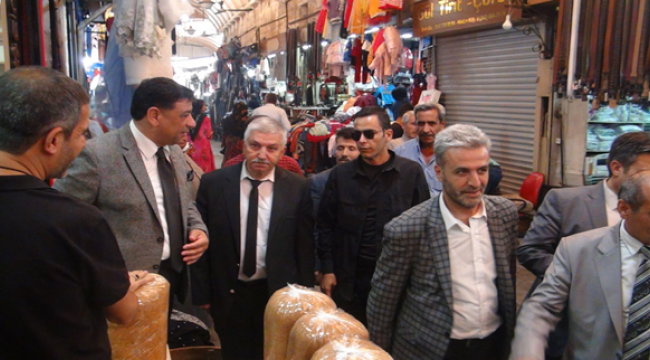  Başkan Aslan, Çarşı esnafı ile bir araya geldi