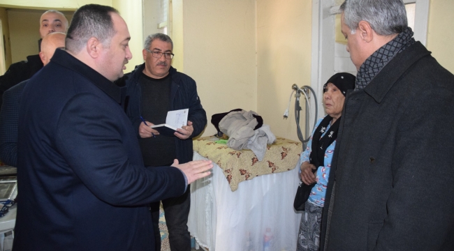 BAŞKAN EKİNCİ'DEN EVİ YANAN AİLEYE ZİYARET