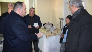 BAŞKAN EKİNCİ'DEN EVİ YANAN AİLEYE ZİYARET