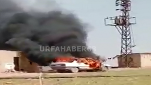 Urfa'da alev alan otomobil içinde bulunan kız ağır yaralandı