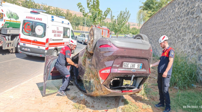 Karaköprü'de otomobil takla attı,2 yaralı