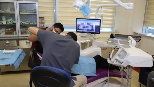 Sinüse kaçan diş kökü çıkarıldı