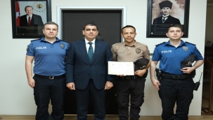 Birecik'te Çarşı ve Mahalle Bekçisi Mustafa Zeybel'e Başarı Belgesi