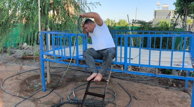 Urfa'da Sıcaktan Kaçış Planı: Hortum, Tahta ve Biraz Gölge