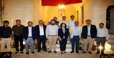 AK aday Ecz. Açanal'dan İSAM'a ziyaret