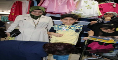 AK Kadınlar Yetim Ve Öksüzleri Giydirdi