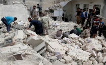 Halep'teki Hava Saldırılarında Ölen Sivil Sayısı 86'ya Yükseldi