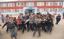 İki Muhtarlık bir okulda