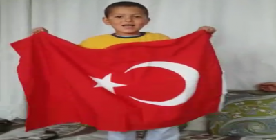 Küçük Çocuktan "Üstümüzden Eksilmesin Al Bayrağın Gölgesi" Marşı