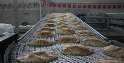 Urfa'da Suriyeliler İçin Ekmek Fabrikası Açıldı